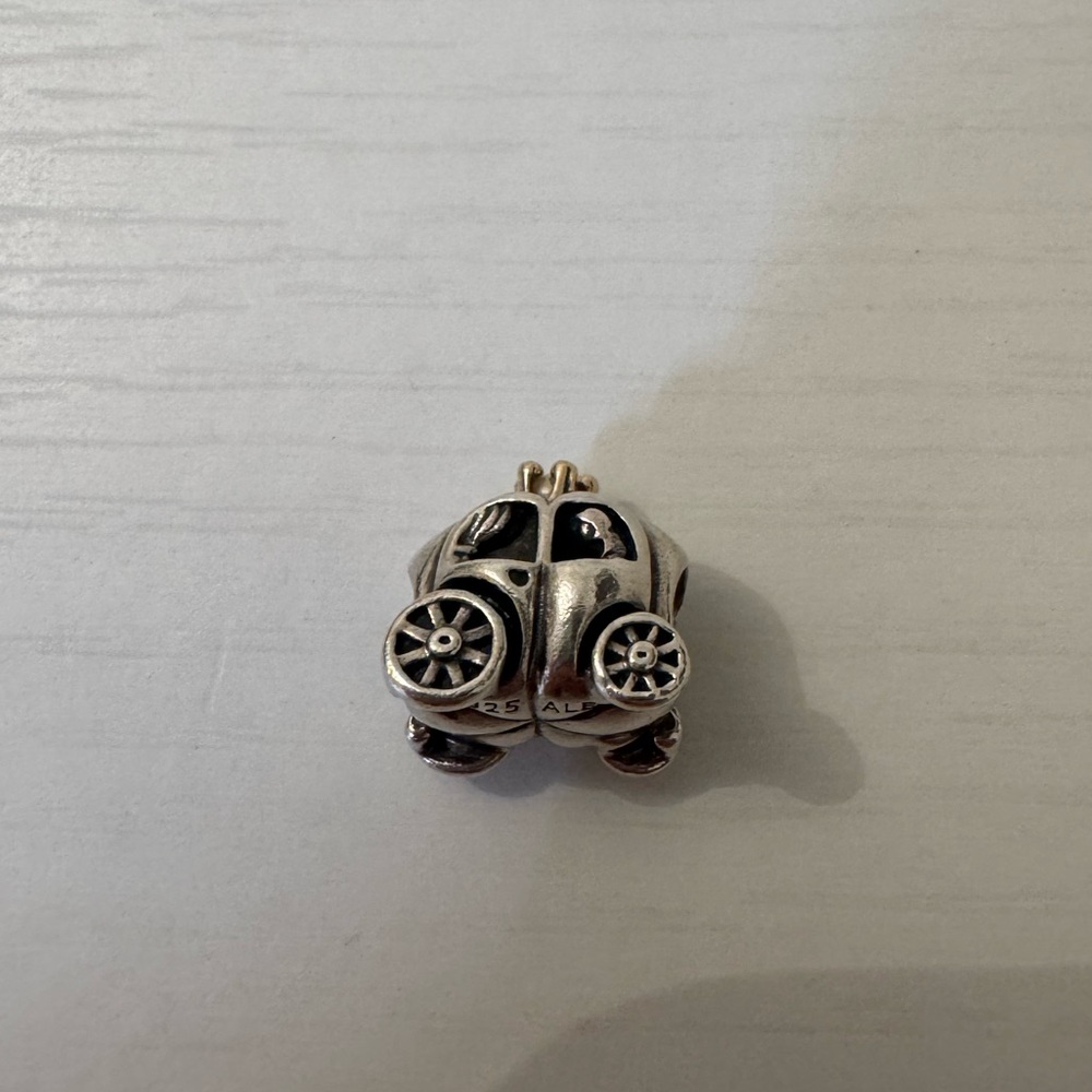 Pandora retired two toned charm